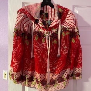 This beautiful hooded top has tags